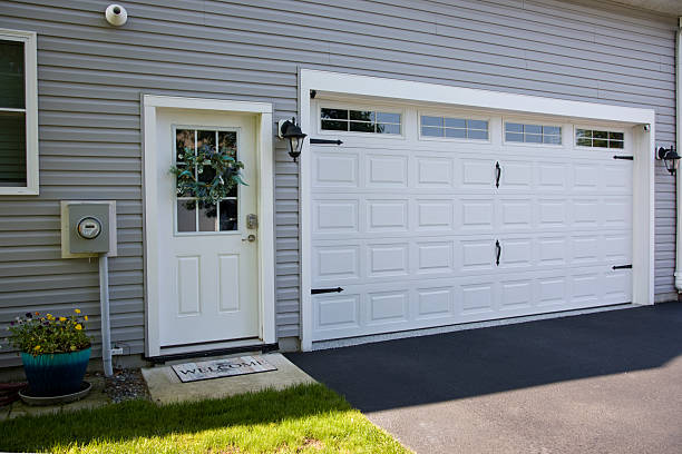 24/7 Emergency Garage Door Panel Replacement experts in Harper County County, KS